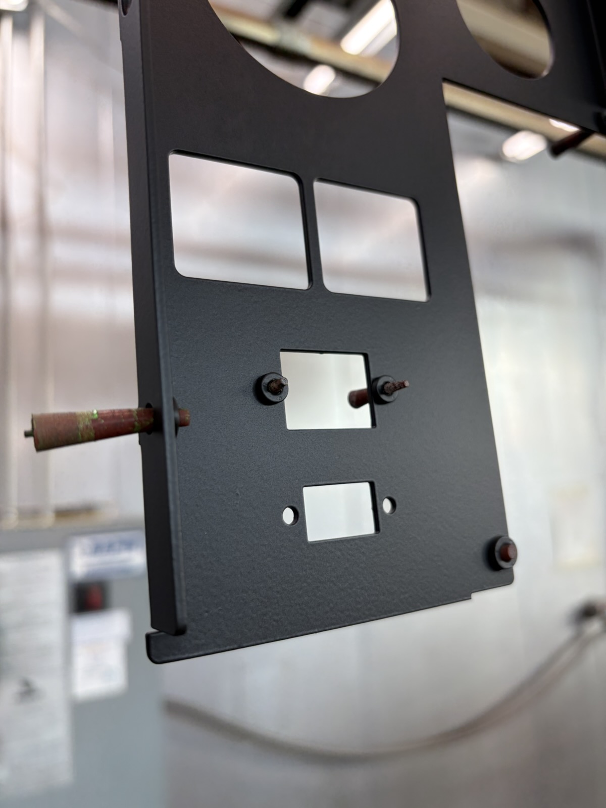 Precision laser-cut mounting bracket with black powder coat
